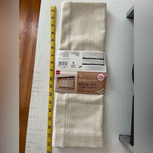 One small cafe curtain panel approx 19”x 40”